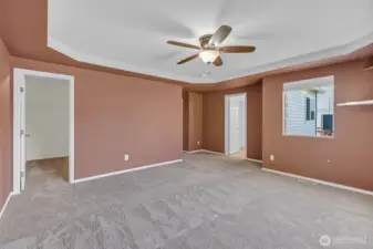 Primary bedroom has huge walk in closet.