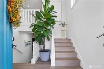 Welcome in! New LVP flooring, trim, lighting, remote blinds, expanded fireplace, fresh paint throughout.