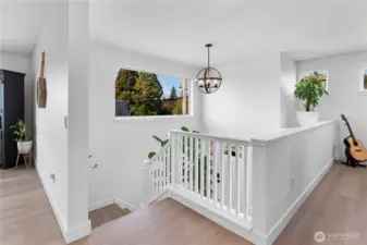 Beautiful, light-filled entry stairwell.