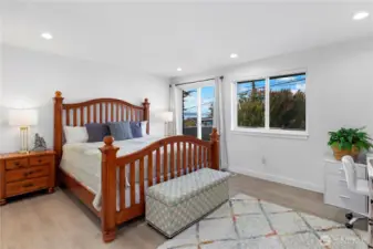 Downstairs, the primary en-suite bedroom