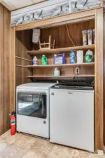 In-home laundry area with washer and dryer included—adding everyday ease and practicality.