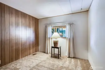 Second bedroom offers cozy comfort and flexibility for guests, crafts, or a quiet reading nook.