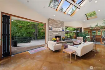 Truly a wow factor. Glass doors are open on both sides of fireplace.