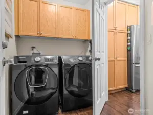 Just off the kitchen, and right inside from the garage is the laundry room.