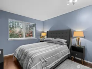 Down the hall, you'll find this proportionate bedroom.