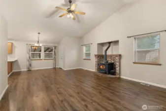 Pellet stove with open dining room and kitchen