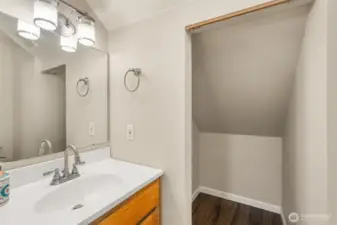 1/2 bath with lots of storage off laundry room