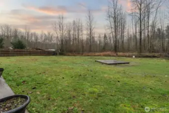 Sprawling fenced backyard ready for your enjoyment