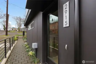 Charming paver path to front door.