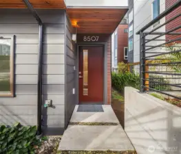 Covered porch leading to front door.