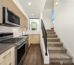 Bright kitchen with ample cabinet storage.