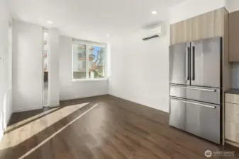 Bright kitchen with ample cabinet storage.