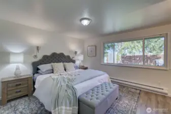 The primary bedroom is located on the main floor. The window faces North, and you have a beautiful view of your back yard.