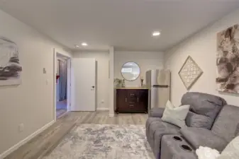 Newer vinyl plank flooring! The downstairs refrigerator stays with the home!