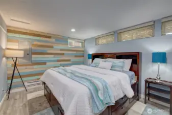 Spacious guest bedroom 3, lower level. Your guests can enjoy their own space with a bedroom, living area and full bath on the lower level!