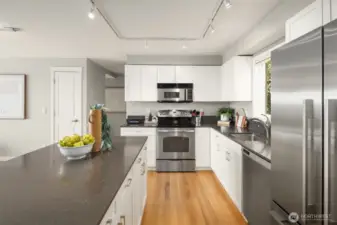 Remodeled kitchen with abundant cabinets