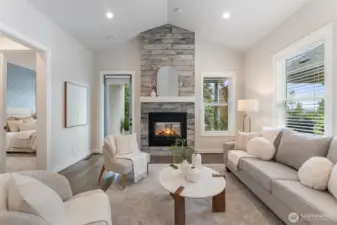 Indoor/outdoor fireplace just off living room