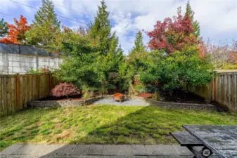 Professionally landscaped. Water feature attaches to natural water underneath (previous owner hooked up, current owner does not)