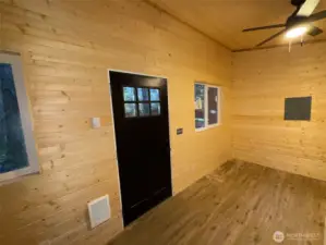 Vinyl windows and wall heaters.