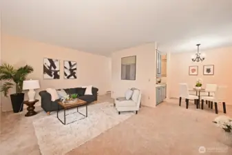 The bright, spacious living room provides room for entertaining.