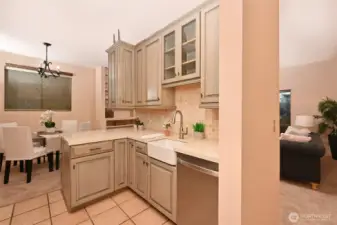 The kitchen is close to the dining and living room.