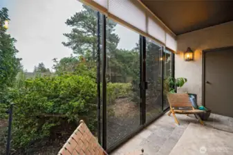 The sunroom has a heater and storage room.  It opens onto a garden area leading to a path to the clubhouse.