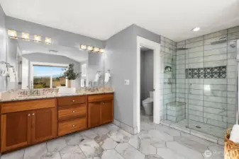 Stunning newly remodeled primary bathroom with Italian marble and custom shower.  Gorgeous!