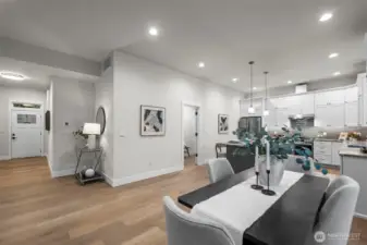 Dining area looking back towards utility/mud room off garage
