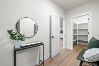 Mud room looking back towards kitchen, into large pantry