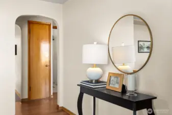 Gleaming hardwood floors greet you as you enter