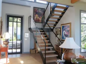 Grand Entry w/architectural steel staircase & French Oak treads