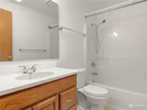 Your great-sized second full bathroom with skylight above allowing for lots of natural light.