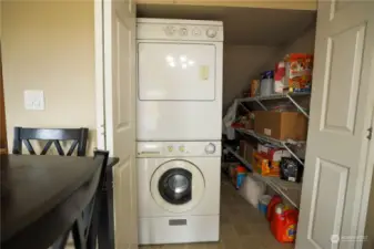 pantry and laundry space. There is some storage space behind the pantry as well.