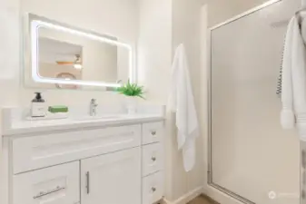 Amazing!  Remodeled primary bath with shower, new cabinets, counter top, sink and a smart mirror