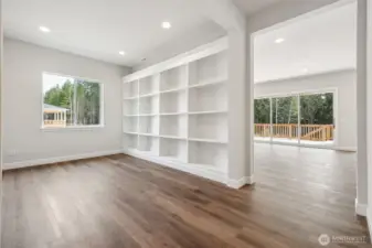 Open study with built-in shelving (this photo is of another Darius floor plan with a different color package.)