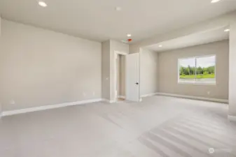 Another angle showing the sitting area looking out to the rear yard, from the primary bedroom