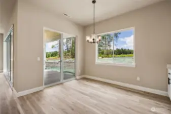 View from dining area through the slider to covered patio