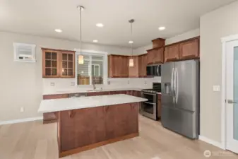 Quartz counters throughout the home. Look at that awesome island, perfect for prepping and entertaining