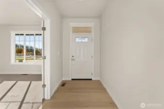 engineered hardwood floors greet you at the entry