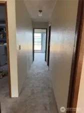 hallway to large extra room