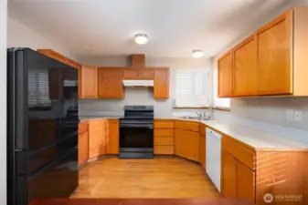 Kitchen has been digitally altered to show what it will look like vacant