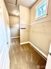 Wonderful walk-in closet in primary.
