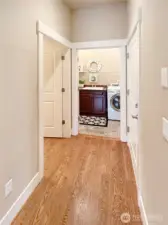 Hallway to garage, powder room and laundry.