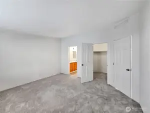 Roomy walk-in closet with abundant hanging space and room for organization—designed to keep everything neatly in place.