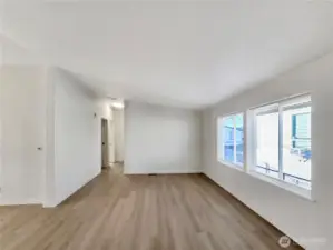 Second living area with access to the bath and additional bedrooms.