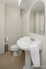 half bathroom next to the rec room on the lower floor