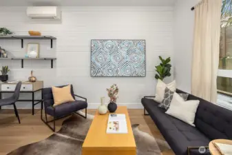 Open concept main floor with large windows and functional flow.