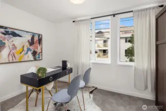 Third bedroom has a built in Murphy bed that conveys. Easily transitions from office to guest room.