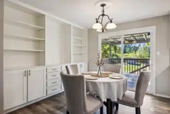 Dining area with built in cabinets.