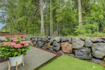 Quiet backyard perfect for gatherings, enjoy gentle sound of a babbling brook